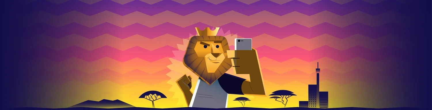 The Big 5 Games lion taking a selfie against an African sunset